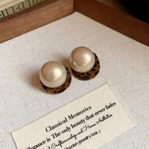 Leopard print round pearl stud earrings with hypoallergenic silver needle pins