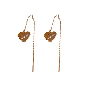 Elegant gold heart-shaped ear threader earrings with LOVE engraving and rhinestones.