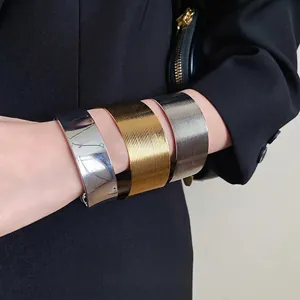 Minimalist stainless steel wide textured cuff bracelets in gold and silver finishes