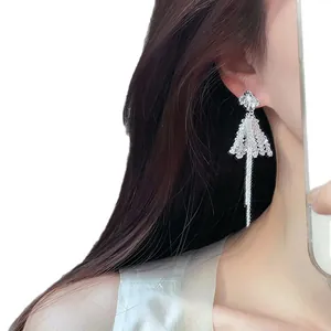 Elegant silver needle flower stud earrings with long shimmering glass bead tassels for women