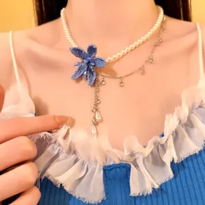 French style pearl necklace with handcrafted blue beaded flower and teardrop pendants