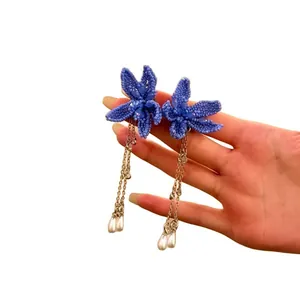 Elegant French style blue beaded flower drop earrings with silver chains and pearls