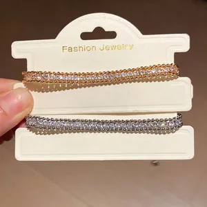 Elegant rhinestone twisted chain bracelets in gold and silver finish