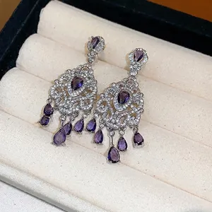 Eleganti orecchini vintage in argento con nappe a fiori in zircone viola scuro