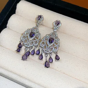 Eleganti orecchini in argento stile palazzo vintage con cristalli viola a goccia e zirconi