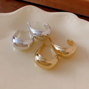 Minimalist metallic waterdrop hoop earrings in polished gold and silver plated finishes