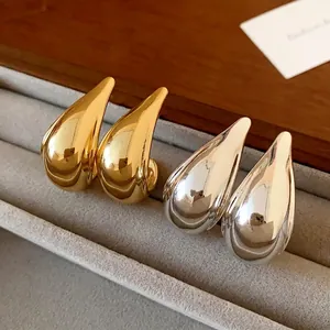 Elegant minimalist metallic waterdrop stud earrings in gold and silver finishes