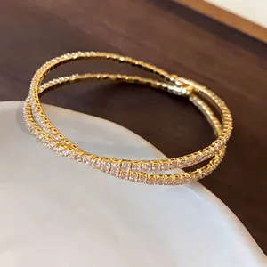 Elegant double-layer cross open bracelet with sparkling zircons in a luxury gold finish