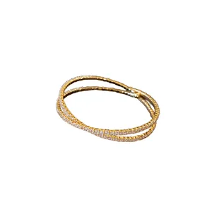 Elegant gold-plated double-layer cross bracelet set with sparkling cubic zirconia stones