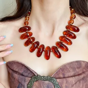 Vintage Maillard style amber resin irregular bead necklace for a chic elegant look