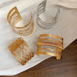 Elegante set di bracciali a polsino aperti in metallo oro e argento stile europeo