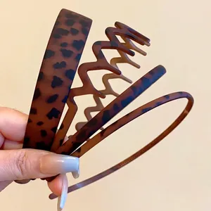 Set of 4 retro matte leopard print headbands with wavy and slim designs for women
