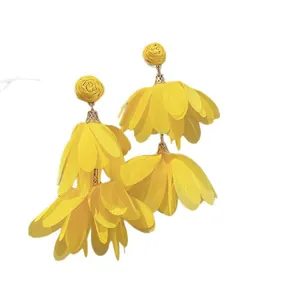 Elegant exaggerated yellow fabric layered flower tassel earrings for a statement look