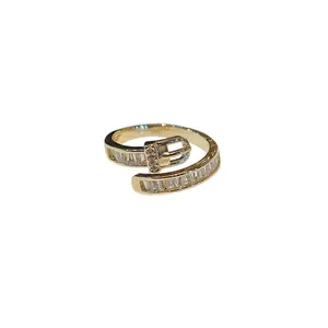 Elegant gold-plated belt buckle ring featuring baguette cubic zirconia stones for women