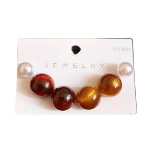 Set of minimalist round resin and pearl stud earrings with 925 silver needles for women