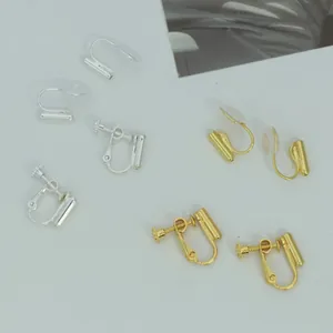 Adjustable gold and silver screw-on earring converters for non-pierced ears.