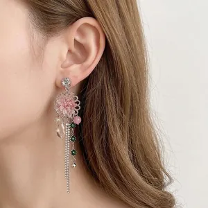 Elegant long floral drop earrings with rhinestone tassels and crystal leaf charm for women