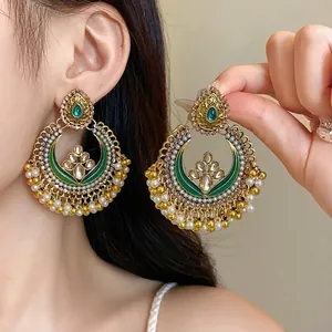 Ornate vintage ethnic style chandelier earrings with green enamel and pearls for women
