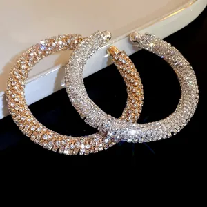 Close-up of luxury rhinestone pavé open bangles with sparkling crystal detail