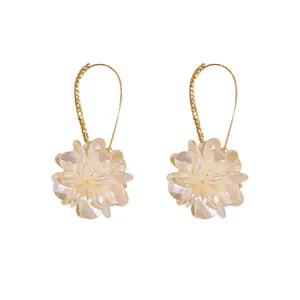 Elegant white flower drop earrings with sparkling rhinestone-encrusted gold hooks for women