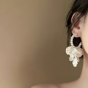 Elegant French style pearl hoop earrings featuring white resin flower petals for women