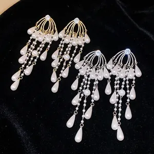 Pendientes de lujo con perlas de borla de circón y agujas de plata para mujeres