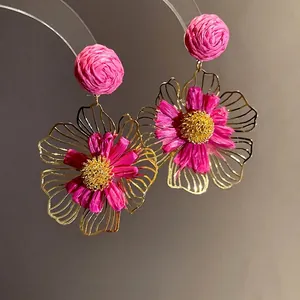 Handmade bohemian style pink raffia flower drop earrings with gold hollow metal petals