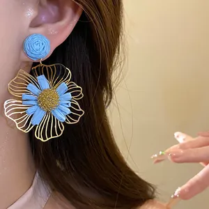 Blue raffia flower drop earrings with golden hollow petals for sweet vacation style
