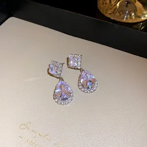Boucles d'oreilles pendantes de luxe en argent avec zircons en goutte et losange pour banquet