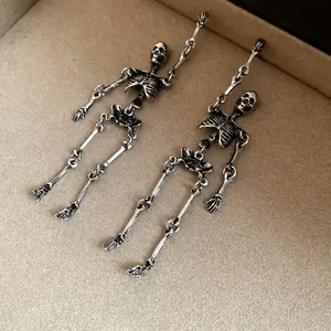 Orecchini pendenti a forma di scheletro in argento vintage con giunti articolati