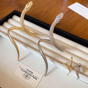Unique twisted snake-shaped open bracelet and ring set in gold and silver finish