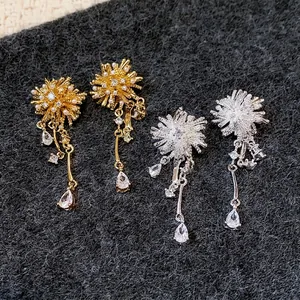 Elegant 18k gold plated fireworks stud earrings with shimmering cubic zirconia