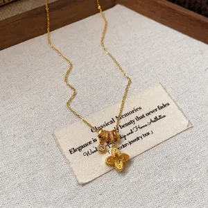 Vintage gold plated floral pendant necklace with sparkling zircon accents for women
