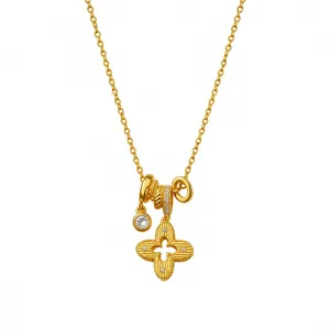 Elegant gold plated necklace featuring a striped flower pendant with zircon accents.