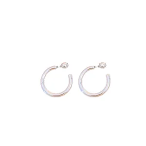 Elegant minimalist silver-tone C-shaped hoop stud earrings with a sleek ball backing.