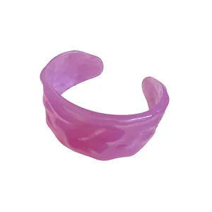 Stylish purple marbled resin cuff bracelet featuring a unique wrinkled texture design