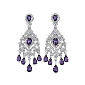 Elegant French vintage silver chandelier earrings with purple zircon teardrops.