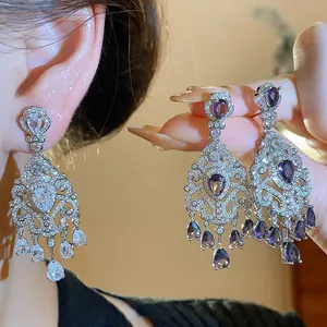 Exquisite French vintage palace style teardrop earrings with purple cubic zirconia