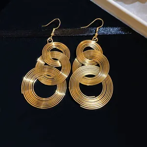 Elegant gold multi-layer concentric circle dangle earrings for women with high luxury style