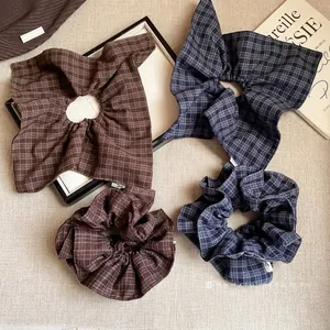 Korean-style plaid fabric hair scrunchies set in brown and blue grid patterns