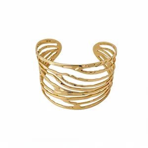 European style gold wide cuff bracelet with irregular organic hollow-out design