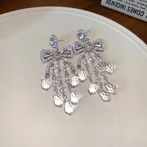 Elegant crystal bow tassel earrings with sparkling cubic zirconia for a romantic fairy look