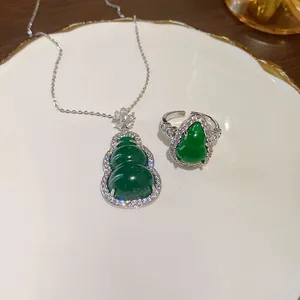 Exquisite detail shot of Neo-Chinese gourd necklace and ring set with green resin