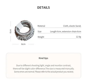 Grey pleated fabric scrunchie hair tie showing dimensions and detailed product specifications