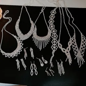 Luxury silver rhinestone tassel jewelry set with shimmering necklaces and earrings