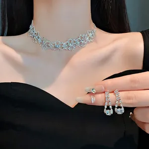 Elegant silver-tone rhinestone choker and drop earrings set for evening gala events