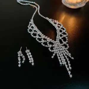Close-up of sparkling rhinestone fringe necklace and earrings for elegant evening gala