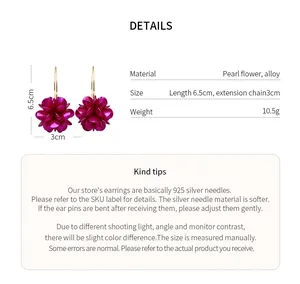 Details of retro purple flower hook earrings showing 6.5cm length and weight 10.5g.