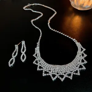 Elegant sparkling rhinestone fringe jewelry set featuring necklace and earrings for evening