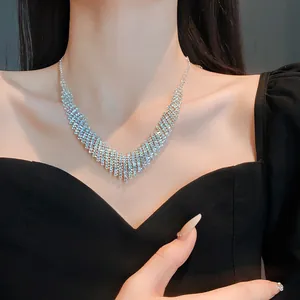 Close-up of sparkling silver rhinestone fringe necklace for evening dinner party dress